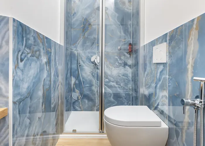 Hostdomus - Azure Loft Free Garage Appartement